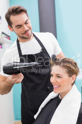 Woman getting her hair dried