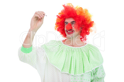 Funny clown smiling and writing
