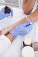 Doctor carrying out a skin prick test