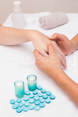 Woman getting a hand massage