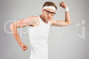 Geeky hipster posing in sportswear
