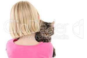 Cute girl holding grey kitten
