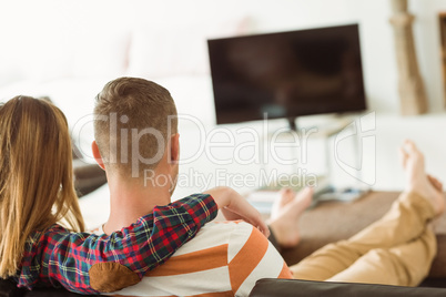 Cute couple relaxing on couch