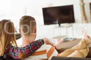 Cute couple relaxing on couch