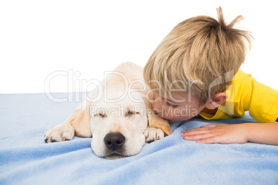 Happy little boy with puppy