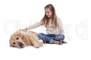 Happy girl petting her dog
