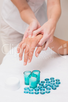 Woman getting a hand massage