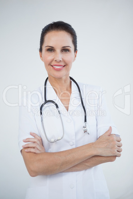 Smiling doctor looking at camera