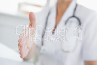 Doctor offering a hand to shake