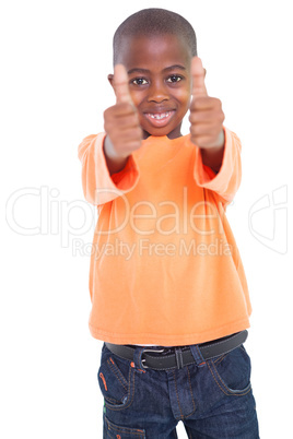 Cute boy showing thumbs up