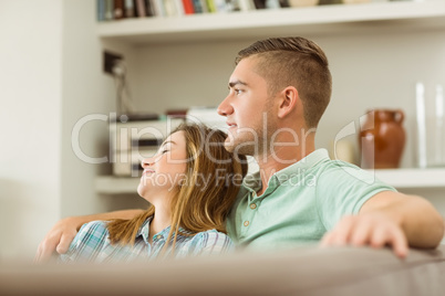 Cute couple relaxing on couch