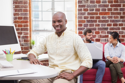 Casual businessman working at his desk