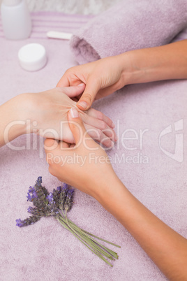 Woman getting a hand massage