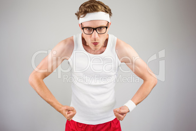 Geeky hipster posing in sportswear