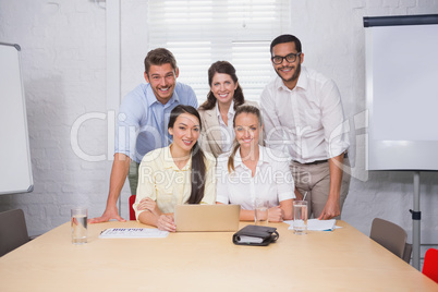 Business people working together at meeting on computer Business people working together at meeting on computer
