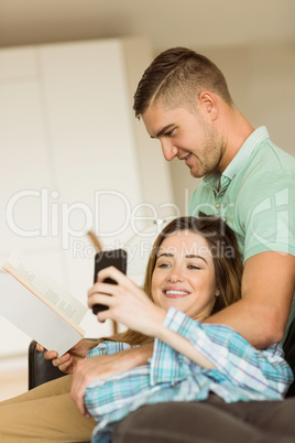 Cute couple relaxing on couch Cute couple relaxing on couch