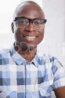 Portrait of a smiling businessman wearing glasses