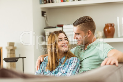 Cute couple relaxing on couch