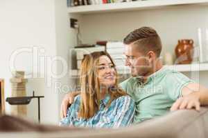 Cute couple relaxing on couch