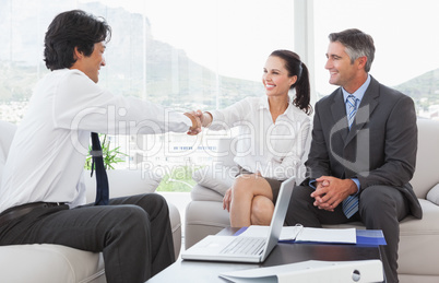 Businessman shaking a clients hand