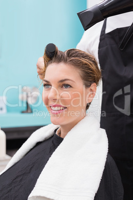 Woman getting her hair dried