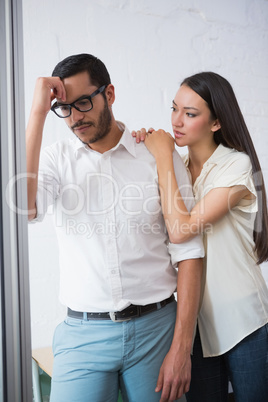 Casual woman consoling friend