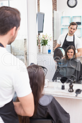 Pretty brunette getting her hair cut