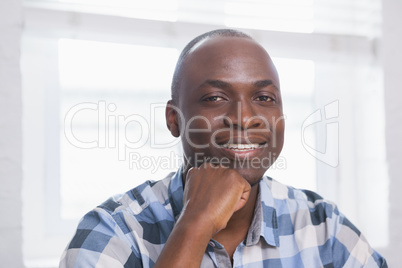 Portrait of a businessman smiling at camera Portrait of a businessman smiling at camera