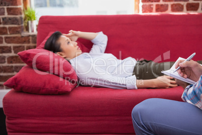 Depressed patient lying on couch