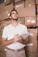 Warehouse worker with clipboard