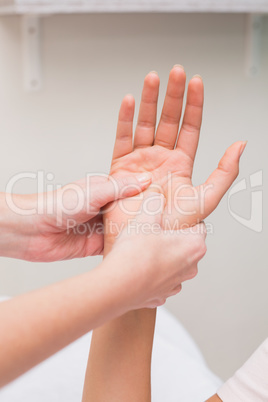 Woman getting a hand massage