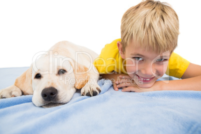 Happy little boy with puppy