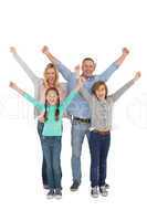 Smiling family raising their arms