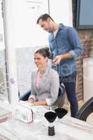 Pretty brunette getting her hair styled