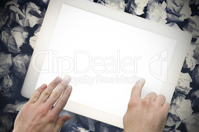 Hands touching tablet screen