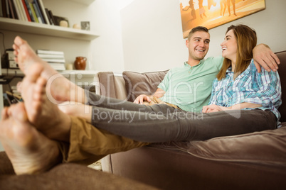 Cute couple relaxing on couch