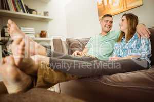 Cute couple relaxing on couch