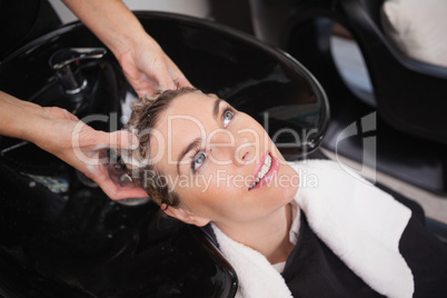 Customer getting their hair washed