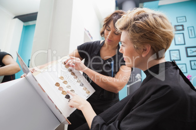 Hairdresser showing hair colour types