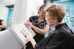 Hairdresser showing hair colour types