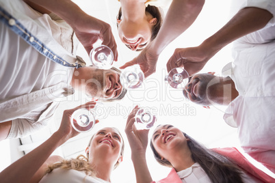 Casual business team toasting with champagne