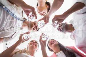 Casual business team toasting with champagne