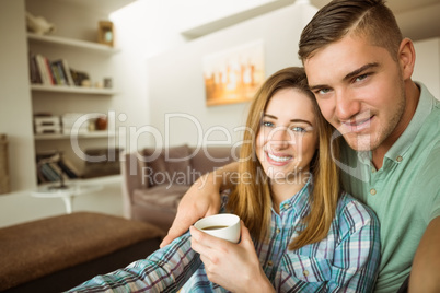 Cute couple relaxing on couch