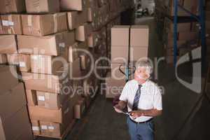 Warehouse worker with clipboard