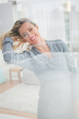 Portrait of happy casual woman with blonde hair