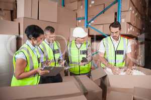 People at work in warehouse