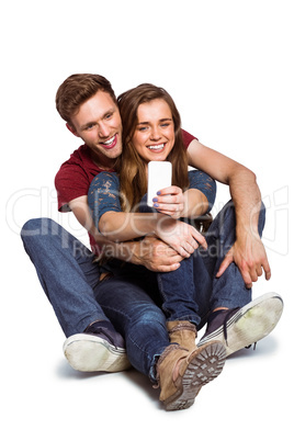 Couple taking selfie with smart phone