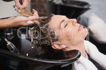 Customer getting their hair washed