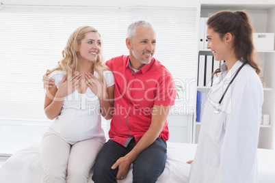 Smiling patient consulting a doctor