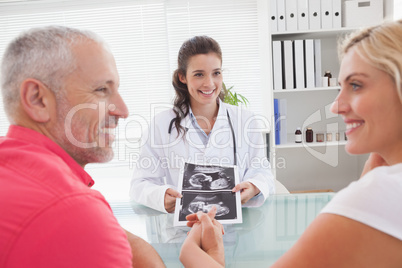 Smiling patient consulting a doctor